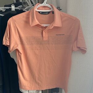 TravisMathew Boys Polo Shirt | Youth 10–13 | Peach Golf Style Top